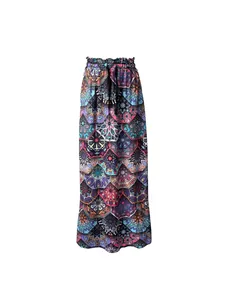 Detailed view of bohemian long skirt featuring vibrant mandala print and elastic waist