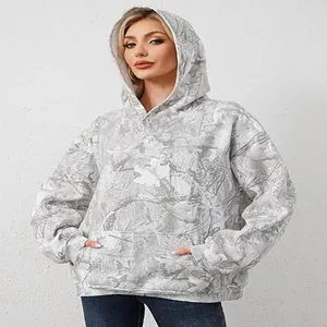 Detail showing the intricate grey camouflage print and soft texture of this women's hoodie