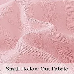 Close-up detail of pink small hollow out fabric texture