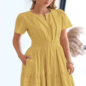 Detailed view of the yellow V-neck tiered maxi dress with stylish short puff sleeves