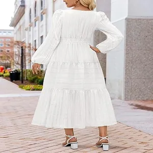 Elegant white long puff sleeve tiered midi dress with smocked waist detail view