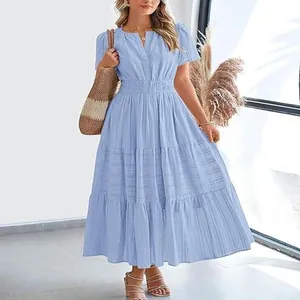 Fashionable V-neck light blue tiered maxi dress with puff sleeves and elastic waist