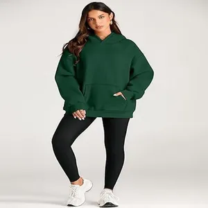 Women's oversized hooded sweatshirt in dark green for casual autumn winter wear