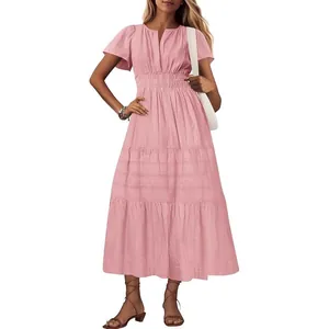 Elegant pink V-neck tiered maxi dress with flutter sleeves and a flattering pleated waist