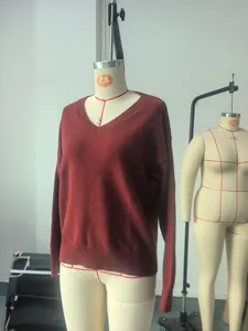 Loose wine red V-neck knit sweater for women displayed on a professional tailor mannequin