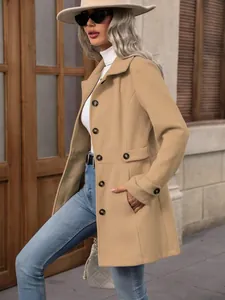 Detailed side view of an elegant khaki lapel wool coat worn by a model in an urban setting