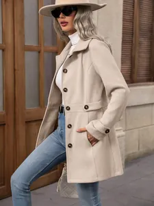 Detail view showing the texture and fit of a sophisticated beige lapel wool coat.