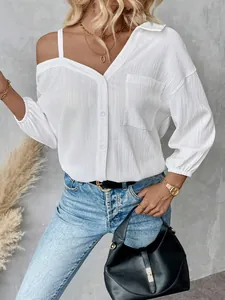 Close-up of white textured off-shoulder shirt with single-breasted buttons and lapel collar