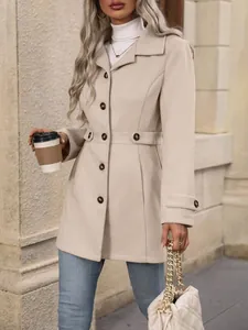 Detailed view of women's slim-fit beige woolen coat with black button accents