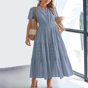 Fashionable light blue V-neck tiered maxi dress with pleated texture and puff sleeves