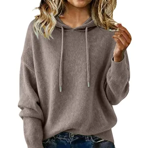 Detail view of the soft frosted texture on a taupe women's hooded drawstring sweater