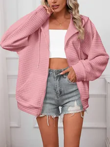 Casual pink waffle-knit zip-up hooded jacket for women with drawstring detail design