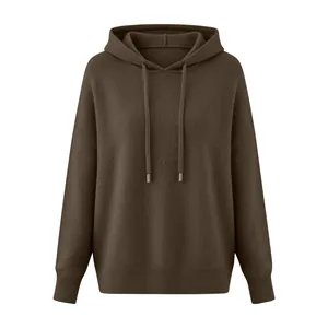 Detail view of dark brown knitted hoodie sweater with drawstring for women.