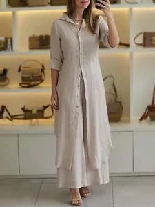 Urban elegant cotton linen two-piece set with long tunic shirt and wide-leg trousers.