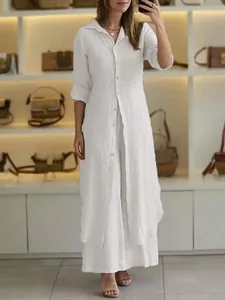 Elegant white linen long-sleeve tunic and wide-leg trousers two-piece set for women.