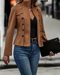 Close-up detail of retro brown faux suede jacket with decorative double-breasted buttons