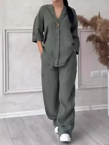 Detailed view of women's olive green cotton linen two-piece set with wide-leg pants