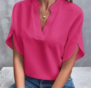 Detailed view of women's fuchsia V-neck blouse with elegant split short batwing sleeves