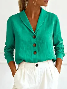 Detailed view of a green linen-blend long sleeve blouse with a stylish doll collar