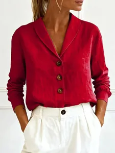 Detailed view of an elegant red cotton-linen blouse featuring a stylish shawl collar.