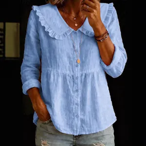 Loose cotton linen long sleeve shirt with a Peter Pan collar and ruffled detail.