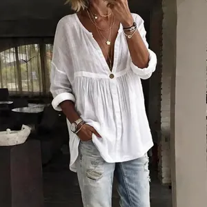Casual losse witte blouse met lange mouwen en knoop voor dames in lentestijl.