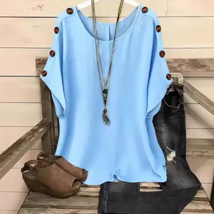 Casual light blue short sleeve blouse with decorative shoulder buttons and round neck
