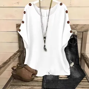 Casual loose white round neck short sleeve top featuring stylish wooden shoulder buttons