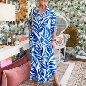 Stylish blue and white leaf print maxi shirt dress for casual summer holiday look