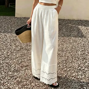 Stijvolle witte wijde katoen-linnen broek met elegant kant voor casual zomerse dagen.