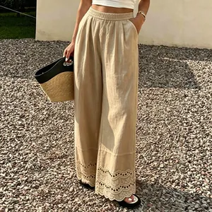 Stijlvolle beige katoenen linnen wijde broek met een elegante kanten zoom voor dames