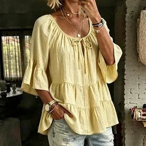Casual loose yellow pleated blouse with three-quarter bell sleeves for summer fashion