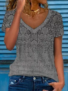 Detail of a grey V-neck t-shirt for women featuring a vintage floral print and loose fit