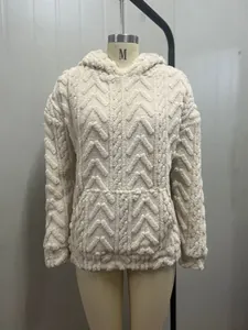 Front detail view of a women's cream jacquard hooded oversized fleece sweatshirt on a mannequin