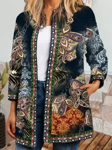 Detailed view of women's vintage ethnic print cardigan with intricate paisley patterns