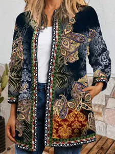 Detailed view of women's vintage ethnic print cardigan with intricate paisley patterns