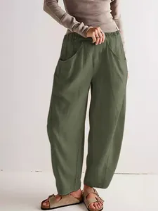 Relaxed fit olive green cotton linen trousers with elastic waist and pockets