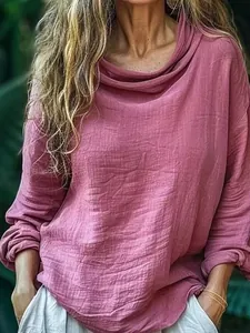 Detail of cowl neck and crinkled fabric texture on this stylish pink long-sleeved top for women