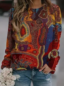 Detail of women's vintage ethnic long-sleeve sweatshirt with colorful abstract pattern