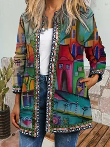 Detail of vintage ethnic print jacket showing artistic house pattern and geometric trim.