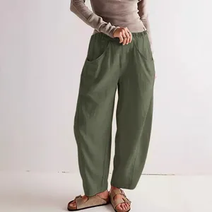 Women's loose cotton linen carrot pants with elastic waist and pockets in olive green