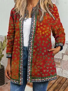 Detailed view of the vintage ethnic print cardigan with heart patterns and borders.