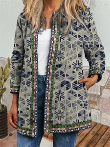 Close-up view of vintage ethnic geometric print on long-sleeved open front cardigan