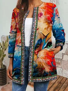 Detailed view of vintage ethnic print women's cardigan featuring a colorful cat