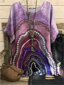 Detail view of women's loose round neck t-shirt with artistic purple geode pattern print