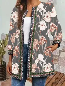 Close-up detail of ethnic floral print vintage open front cardigan jacket for women