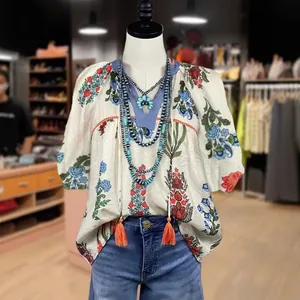 Top bohemio de verano para mujer con estampado floral, cuello en V y detalles de borlas
