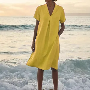 Relaxed fit yellow cotton linen short sleeve V-neck dress with pockets for summer beach outings