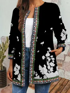 Close-up view of a stylish vintage ethnic floral print cardigan for women in black finish