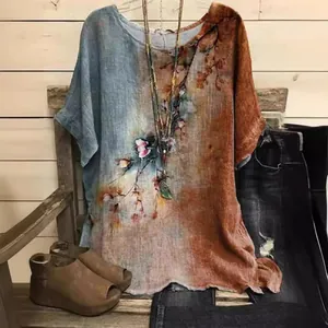 Vintage floral print round neck blouse with color block design for a casual and loose fit style.